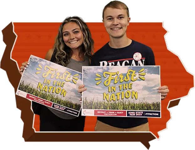 Iowa State with people holding banners